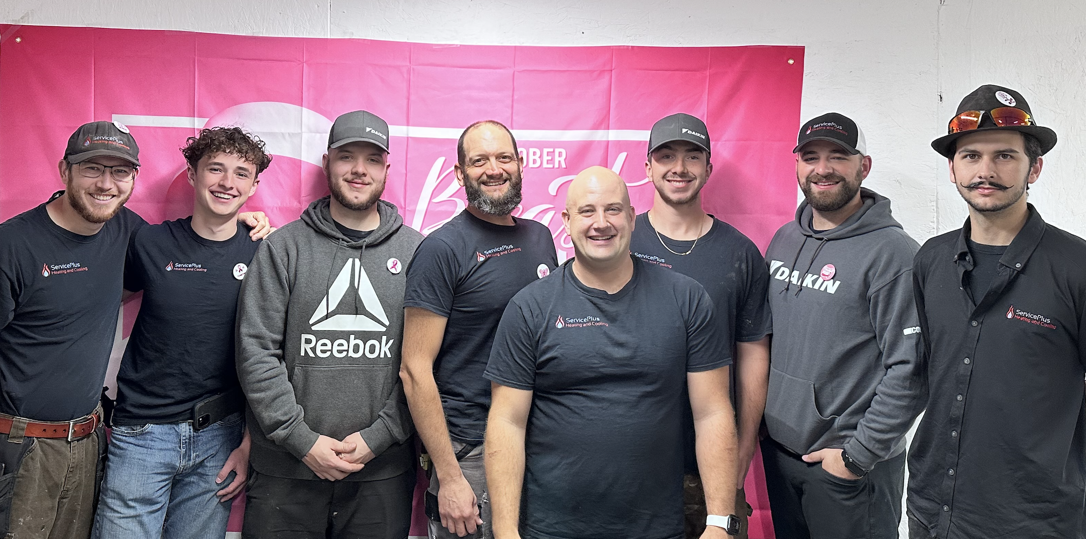 Team photo for breast cancer campaign